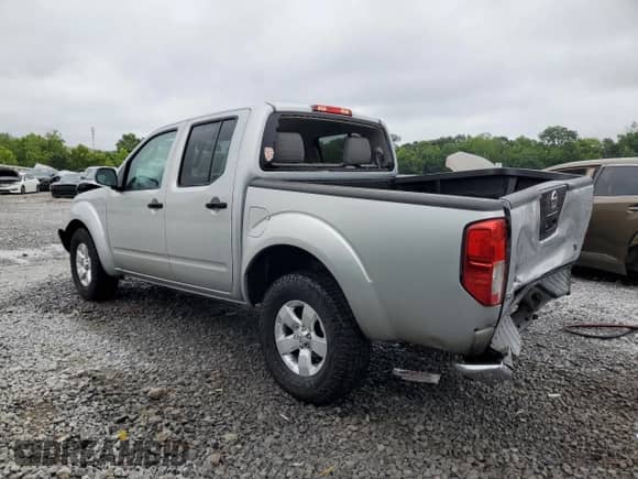 2011 Nissan Frontier SV with VIN 1N6AD0ER7BC430218, listed as a Copart auction lot 63041305 with 185,476 mi miles and Salvage title. Bid and sale history available at DreamBid. Image 2.