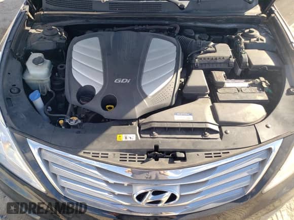 2014 Hyundai Azera Limited с VIN KMHFH4JG0EA385935, выставлен на аукционе Copart как лот 86805355 с пробегом 86 145 миль миль и Списание • Salvage title. История ставок и продаж доступна на DreamBid. Изображение 11.