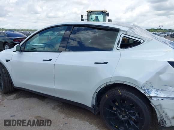 2023 Tesla Model Y Long Range с VIN 7SAYGDEE2PA032311, выставлен на аукционе IAAI как лот 42720695 с пробегом 20 640 миль миль и . История ставок и продаж доступна на DreamBid. Изображение 14.