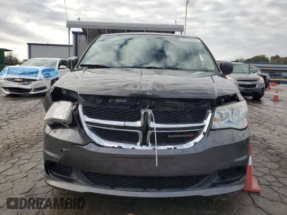2015 Dodge Grand Caravan SXT z VIN 2C4RDGCG1FR581911, wystawiony jako Copart lot #87279635 z przebiegiem 136 076 mil mil oraz Szkoda całkowita • Salvage title. Historia ofert i sprzedaży dostępna na DreamBid. Obrazek 5.