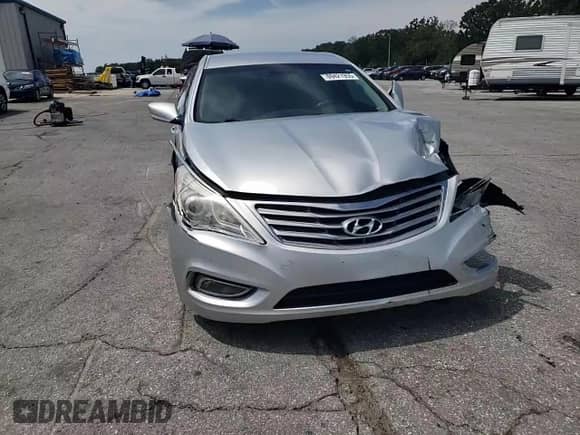 2012 Hyundai Azera с VIN KMHFG4JG1CA140299, выставлен на аукционе Copart как лот 69421955 с пробегом 91 285 миль миль и Списание • Salvage title. История ставок и продаж доступна на DreamBid. Изображение 14.