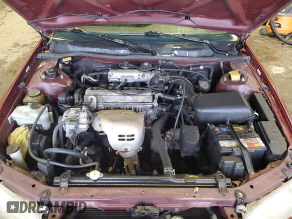 1999 Toyota Camry LE z VIN 4T1BG22K5XU592850, wystawiony jako Copart lot #86079665 z przebiegiem 347 392 mil mil oraz Szkoda całkowita • Salvage title. Historia ofert i sprzedaży dostępna na DreamBid. Obrazek 11.