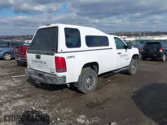 2011 GMC Sierra 1500 Work Truck z VIN 1GTN2TE01BZ326091, wystawiony jako IAAI lot #41516755 z przebiegiem Nie podano mil oraz . Historia ofert i sprzedaży dostępna na DreamBid. Obrazek 4.