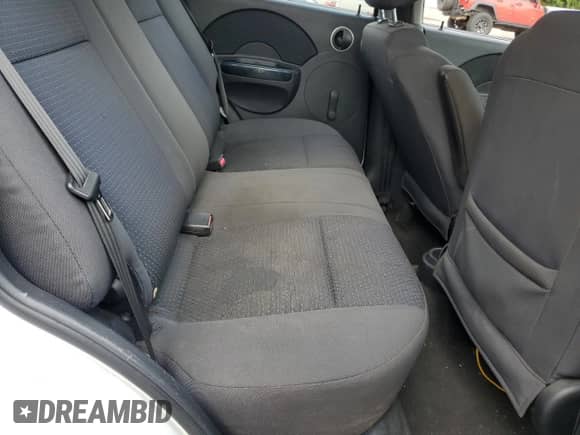 2008 Chevrolet Aveo LS с VIN KL1TD66618B115391, выставлен на аукционе Copart как лот 80636165 с пробегом Не указан миль и Списание • Salvage title. История ставок и продаж доступна на DreamBid. Изображение 11.
