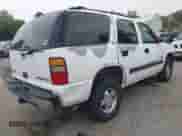 2001 Chevrolet Tahoe LT z VIN 1GNEC13T01R186863, wystawiony jako IAAI lot #42053232 z przebiegiem 345 089 mil mil oraz . Historia ofert i sprzedaży dostępna na DreamBid. Obrazek 4.