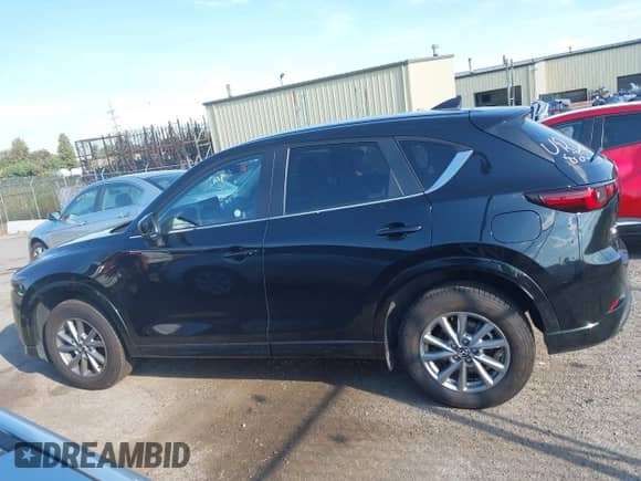 2025 Mazda CX-5 S Select z VIN JM3KFBBLXS0674290, wystawiony jako IAAI lot #43138676 z przebiegiem 5 536 mil mil oraz . Historia ofert i sprzedaży dostępna na DreamBid. Obrazek 14.
