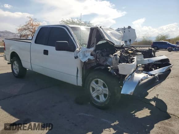 2005 Ford F-150 STX with VIN 1FTRX12W65NA19284, listed as a Copart auction lot 71751235 with Not provided miles and Salvage title. Bid and sale history available at DreamBid. Image 4.