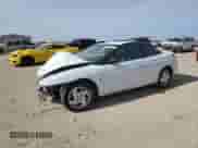 2002 Saturn SC with VIN 1G8ZY12772Z164242, listed as a Copart auction lot 46911695 with 216,124 mi miles and Salvage title. Bid and sale history available at DreamBid. Image 1.