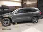2021 Jeep Grand Cherokee 80th Anniversary with VIN 1C4RJFBG2MC767757, listed as a IAAI auction lot 42008442 with 98,227 mi miles and . Bid and sale history available at DreamBid. Image 15.