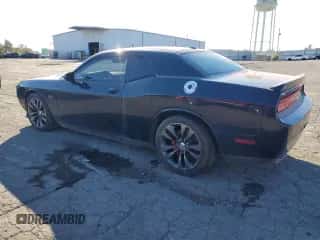 2013 Dodge Challenger SRT-8 with VIN 2C3CDYCJ9DH668163, listed as a Copart auction lot 86838185 with 94,723 mi miles and Clean title. Bid and sale history available at DreamBid. Image 2.
