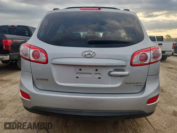 2010 Hyundai Santa Fe GLS z VIN 5NMSGDAB0AH366652, wystawiony jako Copart lot #82226165 z przebiegiem 137 406 mil mil oraz Czysty tytuł • Clean title. Historia ofert i sprzedaży dostępna na DreamBid. Obrazek 6.