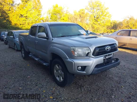 2012 Toyota Tacoma z VIN 3TMMU4FN5CM043847, wystawiony jako IAAI lot #43447652 z przebiegiem 119 376 mil mil oraz . Historia ofert i sprzedaży dostępna na DreamBid. Obrazek 1.