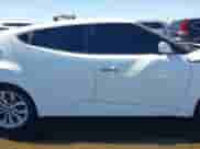 2014 Hyundai Veloster z VIN KMHTC6AD4EU213537, wystawiony jako IAAI lot #43358808 z przebiegiem 54 973 mil mil oraz . Historia ofert i sprzedaży dostępna na DreamBid. Obrazek 13.