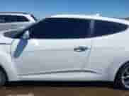 2014 Hyundai Veloster z VIN KMHTC6AD4EU213537, wystawiony jako IAAI lot #43358808 z przebiegiem 54 973 mil mil oraz . Historia ofert i sprzedaży dostępna na DreamBid. Obrazek 14.