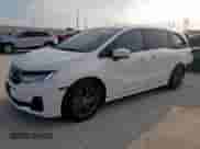 2025 Honda Odyssey Touring z VIN 5FNRL6H80SB005652, wystawiony jako Copart lot #63698095 z przebiegiem 14 314 mil mil oraz Szkoda całkowita • Salvage title. Historia ofert i sprzedaży dostępna na DreamBid. Obrazek 1.