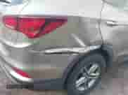 2018 Hyundai Santa Fe 2.4L with VIN 5NMZTDLBXJH092741, listed as a IAAI auction lot 43514175 with 107,947 mi miles and . Bid and sale history available at DreamBid. Image 6.