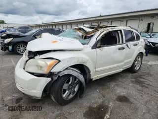 2008 Dodge Caliber SXT with VIN 1B3HB48B58D652564, listed as a Copart auction lot 67326905 with 143,885 mi miles and Salvage title. Bid and sale history available at DreamBid. Image 1.