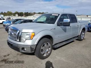 2012 Ford F-150 XL with VIN 1FTFW1CT7CKD20865, listed as a Copart auction lot 87392535 with 91,000 mi miles and Salvage title. Bid and sale history available at DreamBid. Image 1.