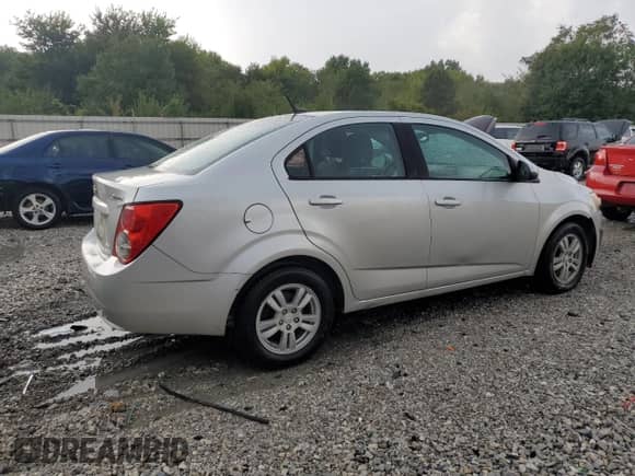 2013 Chevrolet Sonic LS with VIN 1G1JA5SH6D4157461, listed as a Copart auction lot 70907345 with 107,589 mi miles and Salvage title. Bid and sale history available at DreamBid. Image 3.