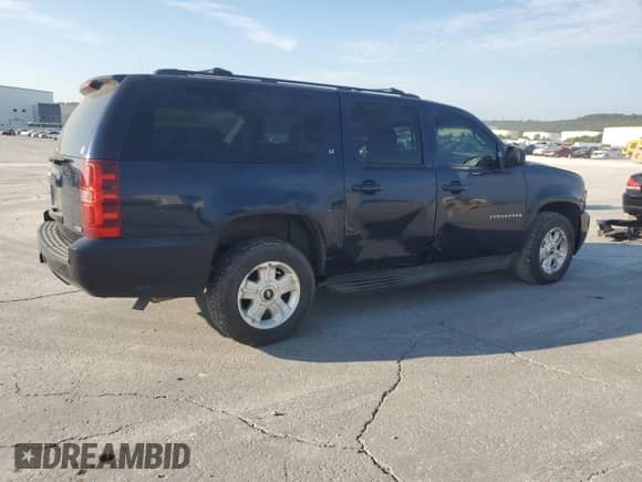 2009 Chevrolet Suburban 2LT с VIN 1GNFK26349R233378, выставлен на аукционе Copart как лот 85160105 с пробегом 214 331 миль миль и Чистый • Clean title. История ставок и продаж доступна на DreamBid. Изображение 3.