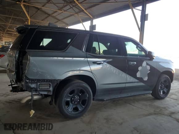 2022 Chevrolet Tahoe Commercial with VIN 1GNSKLED0NR296194, listed as a Copart auction lot 57360005 with 18,427 mi miles and Salvage title. Bid and sale history available at DreamBid. Image 3.