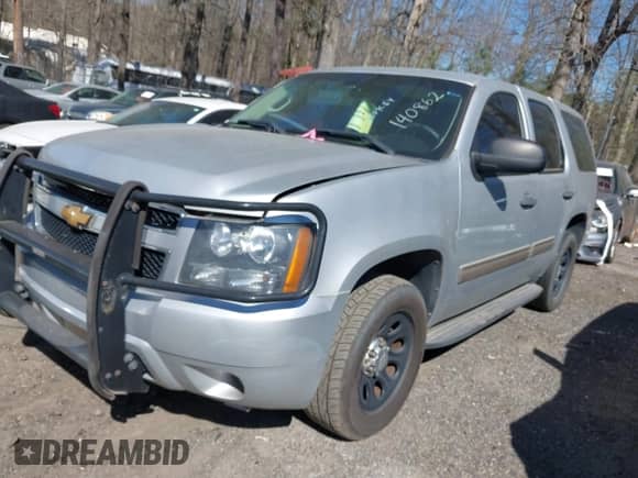 2014 Chevrolet Tahoe Commercial z VIN 1GNLC2E07ER162842, wystawiony jako IAAI lot #41848453 z przebiegiem 175 338 mil mil oraz . Historia ofert i sprzedaży dostępna na DreamBid. Obrazek 2.