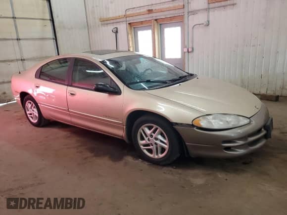 2000 Dodge Intrepid z VIN 2B3HD46R0YH259939, wystawiony jako Copart lot #70315235 z przebiegiem 122 820 mil mil oraz Czysty tytuł • Clean title. Historia ofert i sprzedaży dostępna na DreamBid. Obrazek 4.
