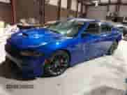 2021 Dodge Charger Scat Pack Widebody z VIN 2C3CDXGJ6MH675379, wystawiony jako IAAI lot #40803508 z przebiegiem 41 787 mil mil oraz . Historia ofert i sprzedaży dostępna na DreamBid. Obrazek 17.