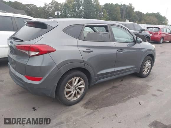 2016 Hyundai Tucson SE with VIN KM8J23A45GU221402, listed as a IAAI auction lot 43378531 with 151,478 mi miles and . Bid and sale history available at DreamBid. Image 4.