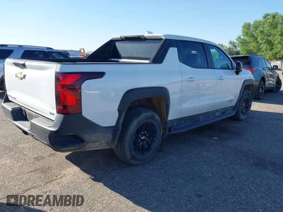 2024 Chevrolet Silverado EV Work Truck z VIN 1GC10UED7RU202184, wystawiony jako IAAI lot #42660300 z przebiegiem 10 708 mil mil oraz . Historia ofert i sprzedaży dostępna na DreamBid. Obrazek 4.
