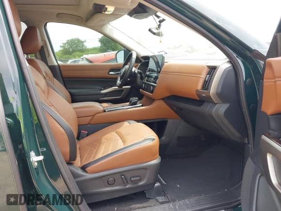 2023 Nissan Pathfinder Platinum with VIN 5N1DR3DH7PC275524, listed as a IAAI auction lot 42061025 with 22,670 mi miles and . Bid and sale history available at DreamBid. Image 5.