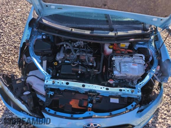 2016 Toyota Prius One z VIN JTDKDTB39G1138498, wystawiony jako Copart lot #68673065 z przebiegiem Nie podano mil oraz Szkoda całkowita • Salvage title. Historia ofert i sprzedaży dostępna na DreamBid. Obrazek 11.