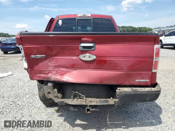 2014 Ford F-150 XLT with VIN 1FTFW1EF2EFA11050, listed as a Copart auction lot 86059055 with 330,908 mi miles and Salvage title. Bid and sale history available at DreamBid. Image 6.