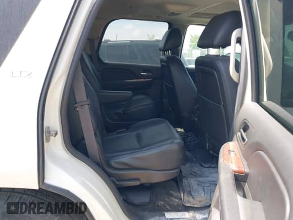 2014 Chevrolet Tahoe LTZ z VIN 1GNSKCE00ER248482, wystawiony jako IAAI lot #42276740 z przebiegiem 158 454 mil mil oraz . Historia ofert i sprzedaży dostępna na DreamBid. Obrazek 8.