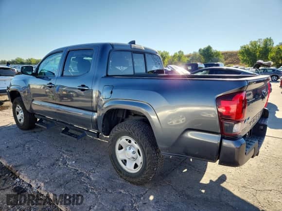 2021 Toyota Tacoma SR with VIN 3TMCZ5AN5MM372463, listed as a Copart auction lot 80795315 with 96,318 mi miles and Salvage title. Bid and sale history available at DreamBid. Image 2.