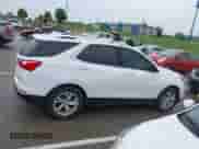 2021 Chevrolet Equinox Premier with VIN 3GNAXNEV5MS160043, listed as a IAAI auction lot 42109564 with 36,808 mi miles and . Bid and sale history available at DreamBid. Image 13.