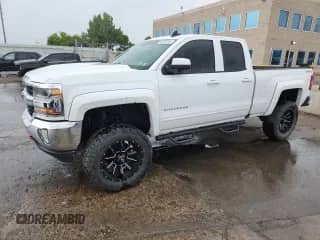 2017 Chevrolet Silverado 1500 LT with VIN 1GCVKREC7HZ199983, listed as a Copart auction lot 69272215 with 116,959 mi miles and Salvage title. Bid and sale history available at DreamBid. Image 1.