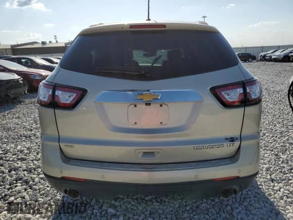 2014 Chevrolet Traverse LTZ с VIN 1GNKVJKD4EJ286170, выставлен на аукционе Copart как лот 80499053 с пробегом 119 738 миль миль и Списание • Salvage title. История ставок и продаж доступна на DreamBid. Изображение 6.