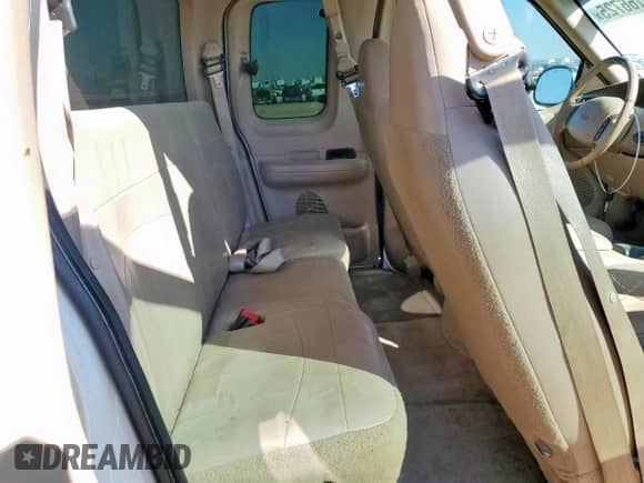 1999 Ford F-150 XL z VIN 1FTRX17L6XKB56034, wystawiony jako Copart lot #85166725 z przebiegiem Nie podano mil oraz Czysty tytuł • Clean title. Historia ofert i sprzedaży dostępna na DreamBid. Obrazek 10.