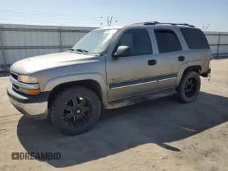 2002 Chevrolet Tahoe LS with VIN 1GNEC13Z22R150369, listed as a Copart auction lot 59337465 with 204,513 mi miles and Salvage title. Bid and sale history available at DreamBid. Image 1.
