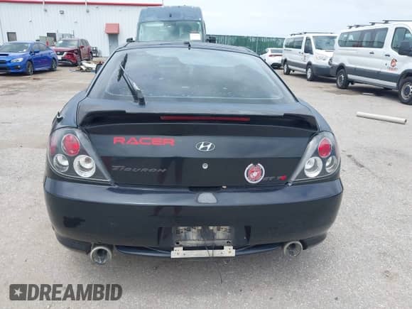 2003 Hyundai Tiburon GT с VIN KMHHN65F63U072432, выставлен на аукционе IAAI как лот 42813911 с пробегом 162 894 миль миль и . История ставок и продаж доступна на DreamBid. Изображение 16.