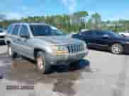 2002 Jeep Grand Cherokee Laredo with VIN 1J4GX48S32C127277, listed as a IAAI auction lot 43125887 with 139,410 mi miles and . Bid and sale history available at DreamBid. Image 1.