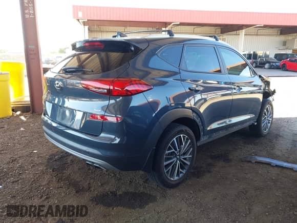 2021 Hyundai Tucson SEL with VIN KM8J3CAL3MU293585, listed as a IAAI auction lot 43319933 with 58,076 mi miles and . Bid and sale history available at DreamBid. Image 4.