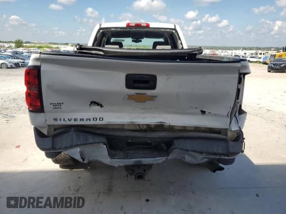 2016 Chevrolet Silverado 2500HD Work Truck with VIN 1GC1KUEGXGF159661, listed as a Copart auction lot 69552065 with 148,414 mi miles and Salvage title. Bid and sale history available at DreamBid. Image 6.