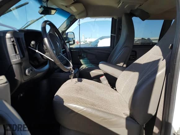 2014 Chevrolet Express Passenger LT с VIN 1GAZG1FG0E1124809, выставлен на аукционе Copart как лот 71378284 с пробегом 177 859 миль миль и Списание • Salvage title. История ставок и продаж доступна на DreamBid. Изображение 7.