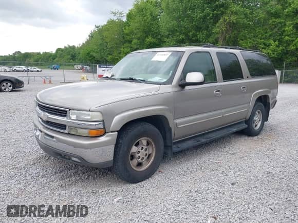 2003 Chevrolet Suburban LT with VIN 1GNEC16Z13J140136, listed as a IAAI auction lot 42142827 with 252,698 mi miles and . Bid and sale history available at DreamBid. Image 2.