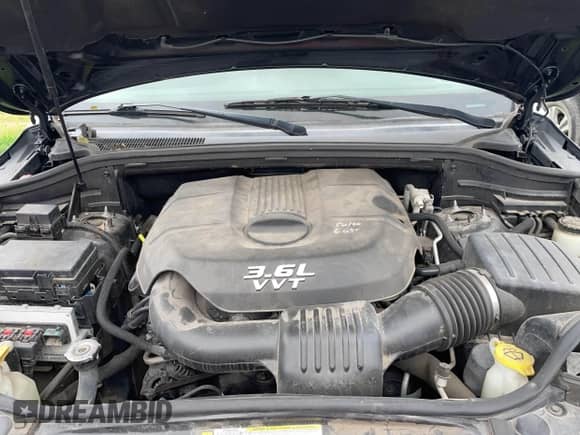 2012 Jeep Grand Cherokee Laredo z VIN 1C4RJEAG8CC119401, wystawiony jako IAAI lot #41724335 z przebiegiem 233 265 mil mil oraz . Historia ofert i sprzedaży dostępna na DreamBid. Obrazek 10.