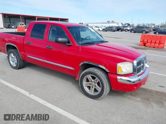2007 Dodge Dakota with VIN 1D7HE58K77S235894, listed as a IAAI auction lot 41812621 with 210,708 mi miles and . Bid and sale history available at DreamBid. Image 1.