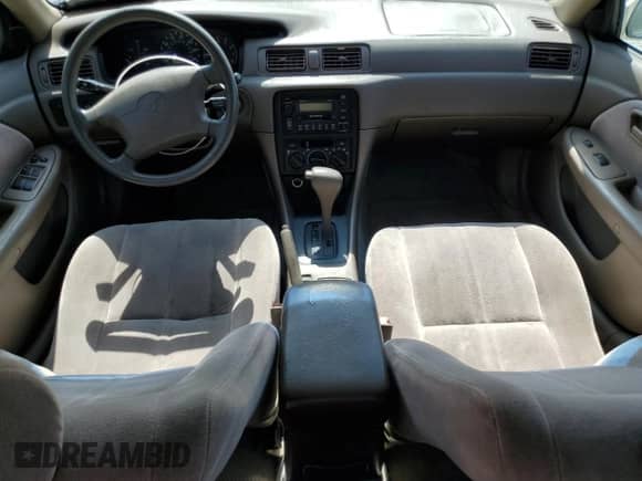 1999 Toyota Camry LE z VIN JT2BG22K2X0274463, wystawiony jako Copart lot #81400995 z przebiegiem 178 308 mil mil oraz Szkoda całkowita • Salvage title. Historia ofert i sprzedaży dostępna na DreamBid. Obrazek 8.