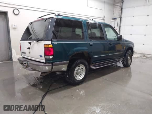 1997 Ford Explorer XLT с VIN 1FMDU35P3VUC49711, выставлен на аукционе IAAI как лот 41414941 с пробегом 249 309 миль миль и . История ставок и продаж доступна на DreamBid. Изображение 4.